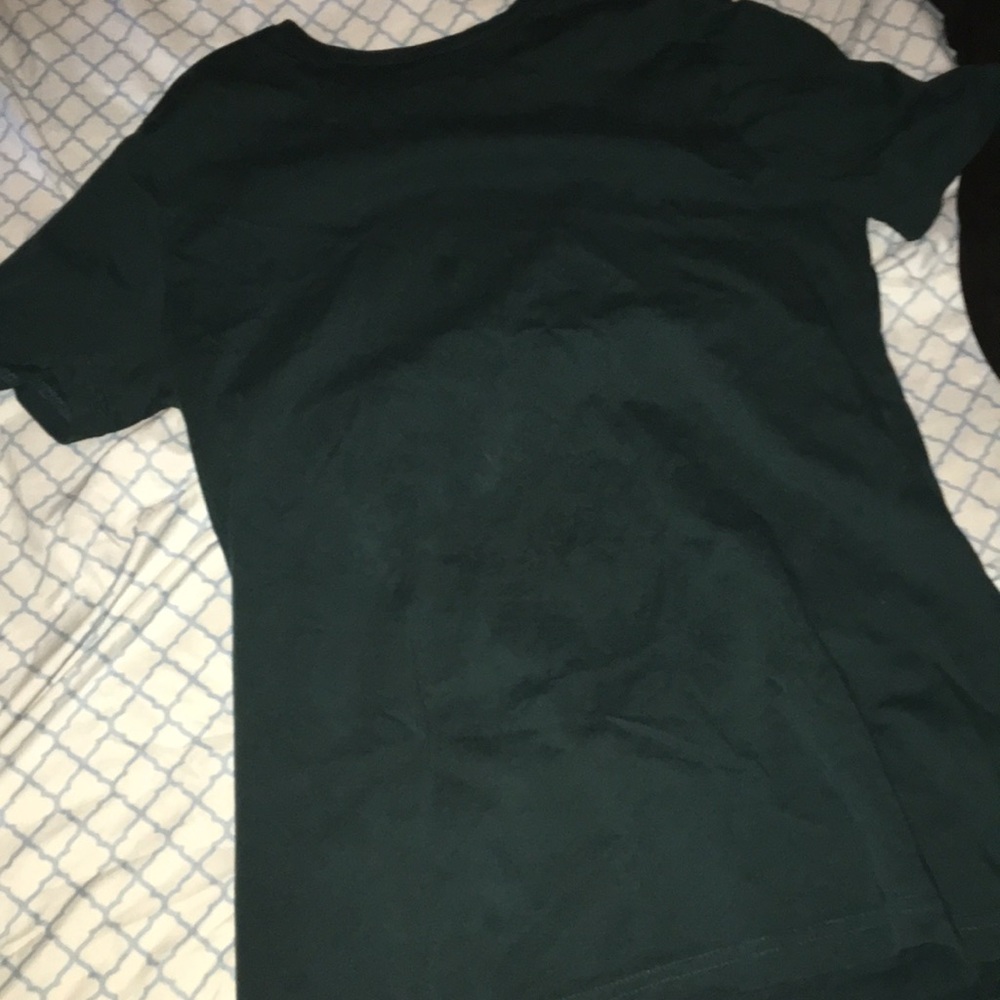 A forest green fitting tee